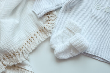 Knitted children's socks and handmade sweater
