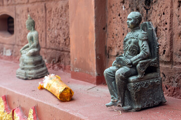 A figurine of King Rama V on the wall of a Buddhist temple, Samut Prakan, Thailand