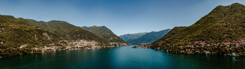 Fototapeta na wymiar Aerial panorama at Como lake on a quiet summer day