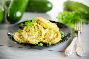 Fried squash green pancakes in a plate.