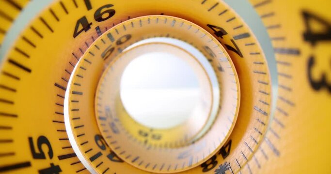 Detailed closeup view of inside of spirally wound measuring tape concept