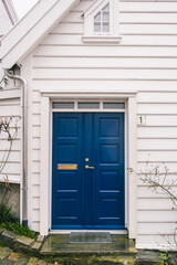 Fototapeta premium The city of Stavanger in Norway on the shore of the North Sea. Beautiful architecture, white wooden houses, beautiful doors.