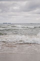 Baltic Sea waves and cloudy sky