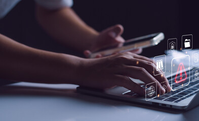 Businessman staff, programmer, developer using technology with triangle caution warning sign notification error and maintenance concept. System warning hacked alert, cyber attack on computer network.