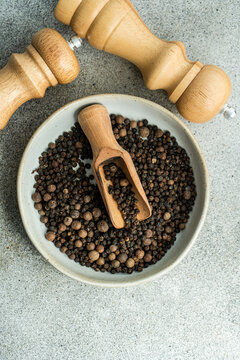 Bowl filled with natural aromatic Black pepper