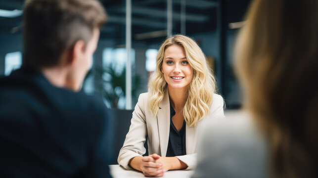 Woman consulting with financial manager in the office, bank and finance concept for investment or job interview for management