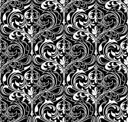 Floral pattern. Vintage wallpaper in the Baroque style. Seamless vector background. White and black ornament for fabric, wallpaper, packaging. Ornate Damask flower ornament