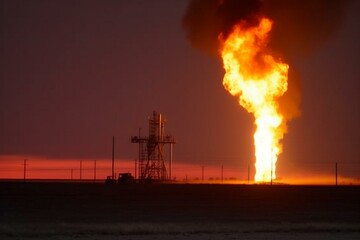 Fire from gas burning in West Texas oilfield. Generative AI