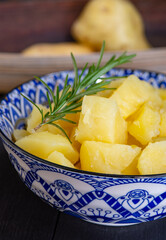boiled potatoes cut into cubes with rosemary
