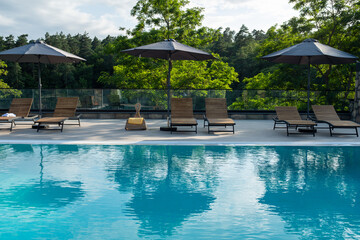 Cozy swimming pool in nature, calm holidays