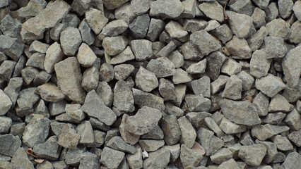 Natural background of crushed stone texture.