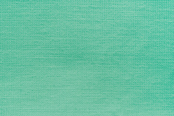 Green cotton twill fabric pattern close up as background