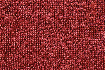 Maroon soft towel cotton fabric texture as background

