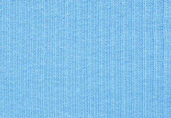 Light blue soft ribbed jersey fabric texture as background
