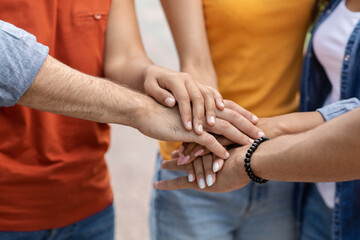 Unity Concept. Group Of Unrecognizable Young People Joining Hands Together