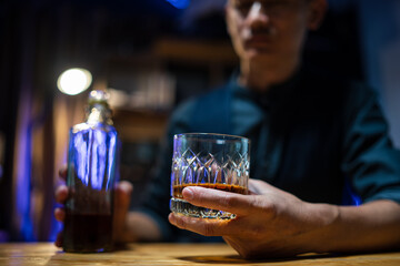 Bartender or businessman bartender pouring whiskey