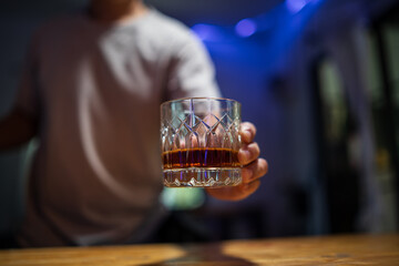 Barman pouring whiskey whiskey glass beautiful night