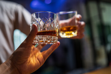 Bartender or businessman bartender pouring whiskey