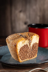 Marble cake and cup of coffee on the table.