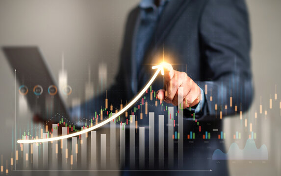 Investment and financial concept, Interest rate and dividend, Businessman  working with digital finance technology of invest strategy for perceptive financial business decision.