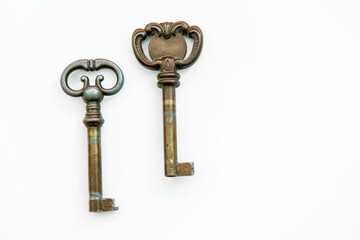 Old keys on a white background