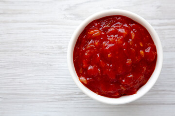 Homemade Mexican Salsa in a Bowl, top view. Flat lay, overhead, from above. Copy space.