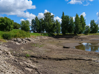 drained river bed with no water is summer