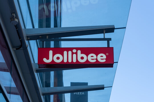 Close up of Jollibee restaurant sign on the building in Surrey, British Columbia, Canada - July 9, 2023. Jollibee is a Filipino chain of fast food restaurants. 