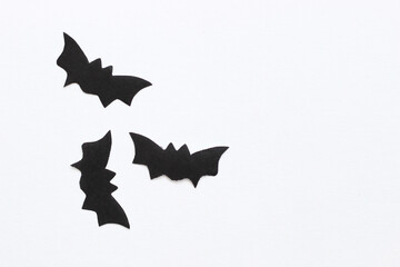 Paper bats on a purple background, Halloween concept