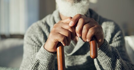 Closeup, senior and hands of man with cane for support, walking help and aging. Morning, house and...