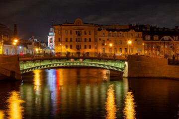 Fototapeta na wymiar One of the picturesque bridges of St. Petersburg at night