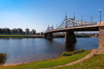 Fototapeta na wymiar Scenic view of the road bridge, monastery and river in Tver, Russia