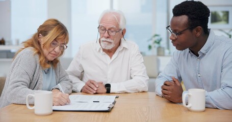 Senior couple, insurance and contract with financial advisor and retirement plan to sign. Document,...