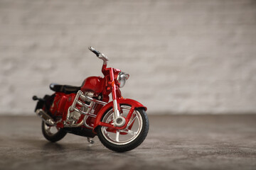Fototapeta na wymiar Miniature motorcycle model for kids