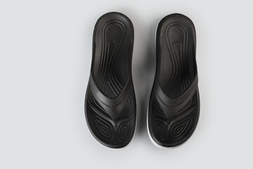 black color Flipflops pair isolated on white background	
