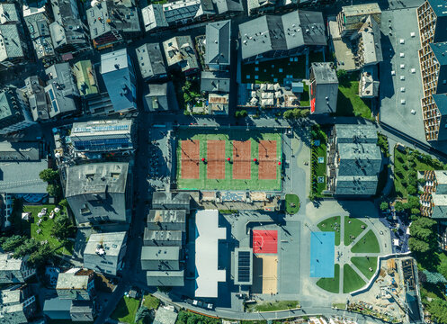 Aerial view of Zermatt main square with tennis courts on the Swiss Alps, Valais, Switzerland.