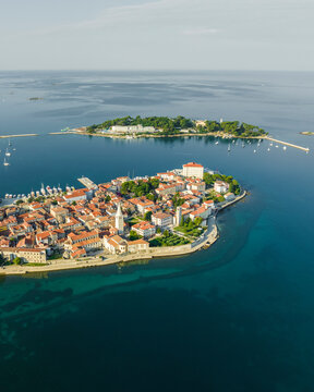 Aerial view of Porec and Otocic Sveti Nikola, a small island, a small town along the Adriatic Sea coastline in Istria, Croatia.