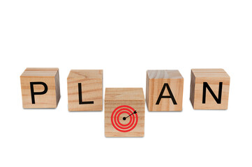 Place a wooden block with the text "PLAN" and a red dart board on isolated on  white background. Business idea for goals and successful growth process.PNG