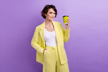 Photo of funky adorable woman dressed yellow jacket enjoying coffee isolated purple color background