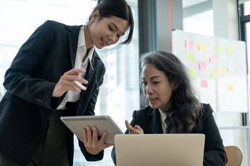 group of business people meeting and brain storming to plan on laptop computer, Creative agency business brain storm meeting presentation, business people teamwork consult organize big data summary.