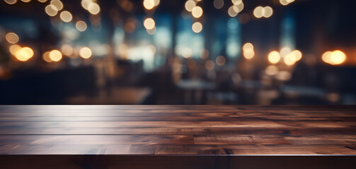 Wooden table standing in the pub, bar, cafe or restaurant in front of the blurred background with beautiful soft bokeh.