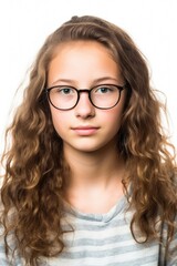 Obraz premium studio portrait of a teenage girl wearing glasses isolated on white