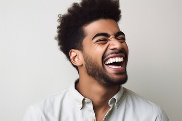 Obraz premium cropped shot of a handsome young man laughing with excitement