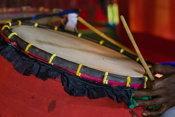 Dhak is part of bengali culture and mostly seen during hindu festival of worshipping goddess...