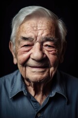portrait of a happy senior man smiling at the camera