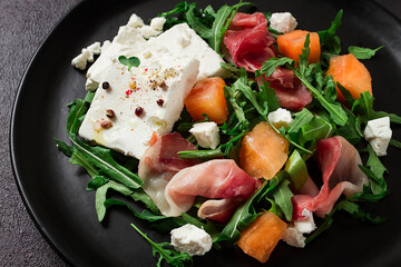 salad, melon with prosciutto, arugula, and cheese, summer salad, vegetarian, homemade, no people,