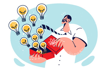 Inspired man with light bulbs flying out of box, symbolizing abundance of ideas after brainstorming