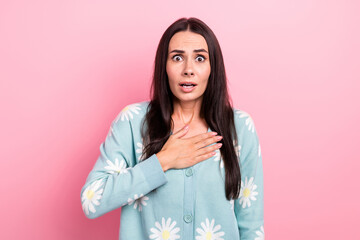 Portrait of astonished speechless girl wear flower print pullover hold palm on chest staring open...
