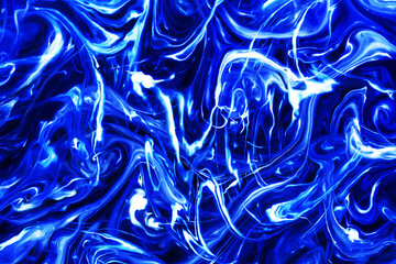 Obraz premium Blue and black paint pigment mix. Ornament mosaic swirl shapes background. Neon glow fluid. Uv light background. Artistic marbling texture. Modern art texture. Closeup science effect.