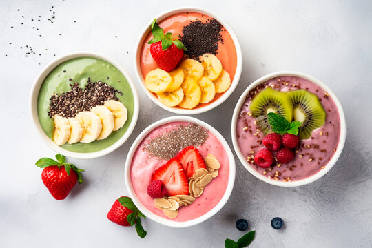 Perfect smoothie bowl with balanced flavors and creative toppings on marble kitchen counter, light colors, American family home, blog website image, homemade, ultra realistic, overhead perspective
